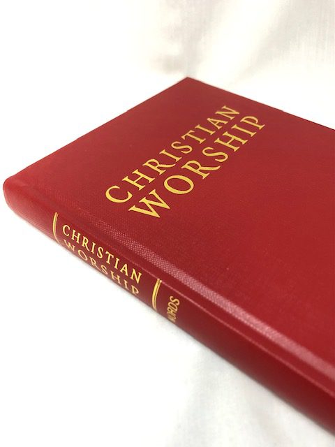 An image of a red hardback book on a white background
